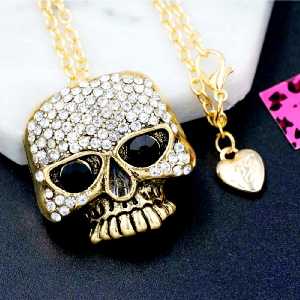 Gold plated white and black crystal skull necklace/brooch